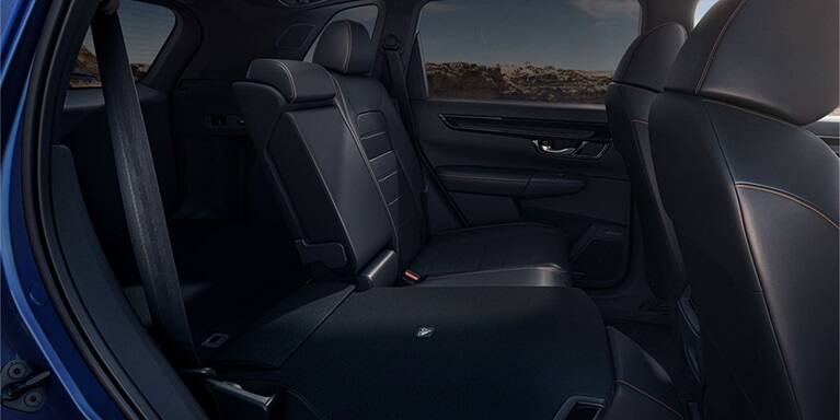 2027 Honda CR-V showing the 60/40 split rear seatback folded down for cargo (Compact Crossover SUV).