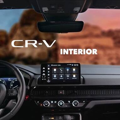 2027 Honda CR-V dashboard featuring the infotainment screen and steering wheel (Compact Crossover SUV).