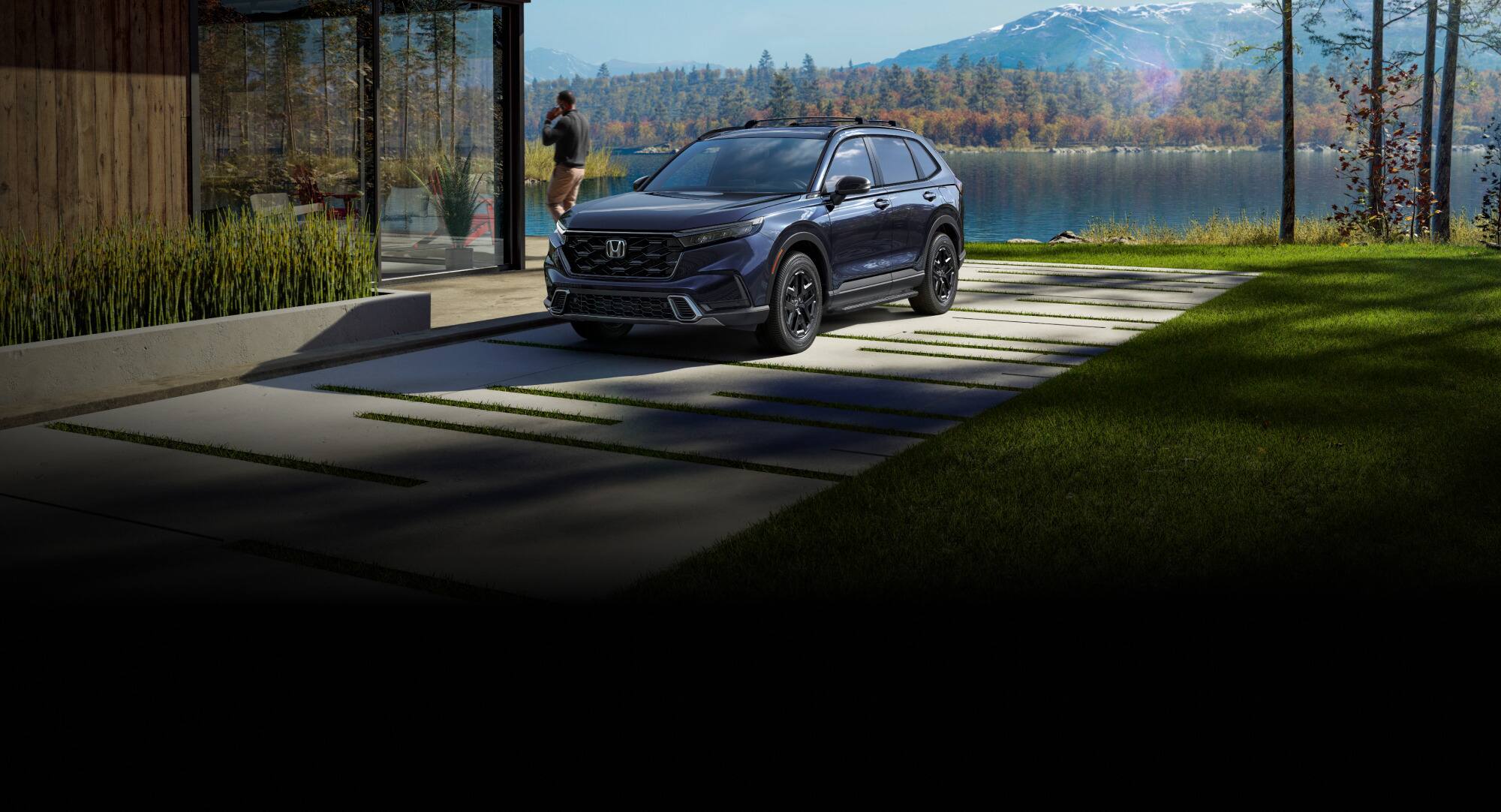 2027 Honda CR-V Sport Touring Hybrid in Canyon River Blue Metallic front parked on a driveway near a lake (Compact Crossover SUV).