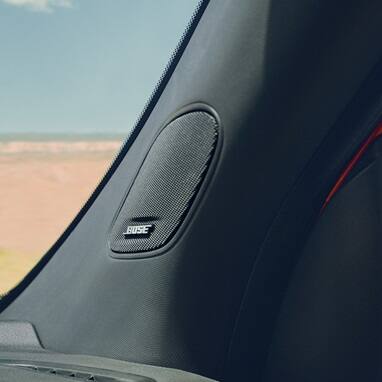 2027 Honda Passport TrailSport Elite interior detail of the premium Bose speakers on the A-pillar (Mid-Size SUV).